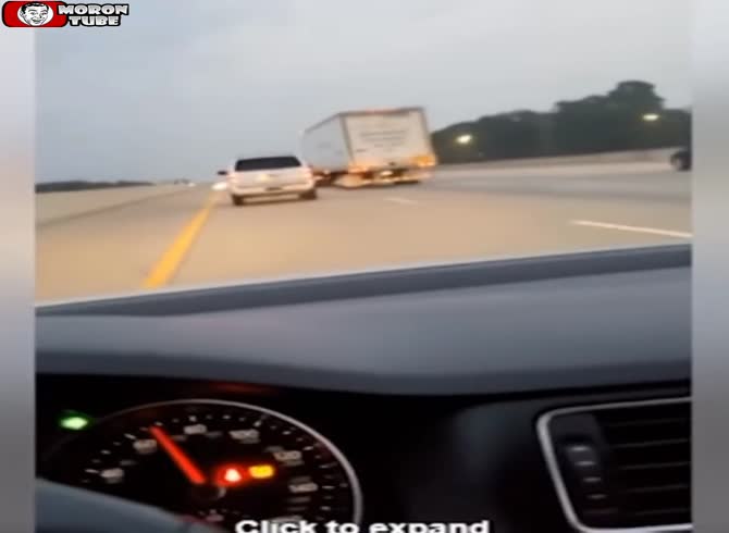 Video :A crazy motorist attempts to shove a family off the road